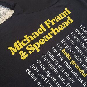Hella Grateful Michael Franti + Spearhead Black Yellow Band Tshirt